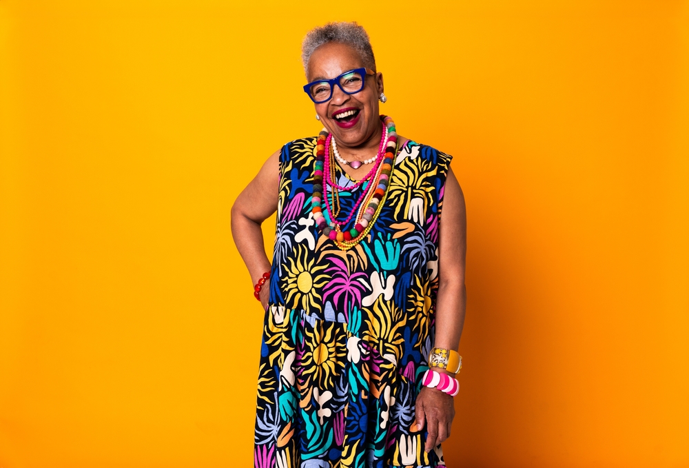 Colorfully dressed senior woman