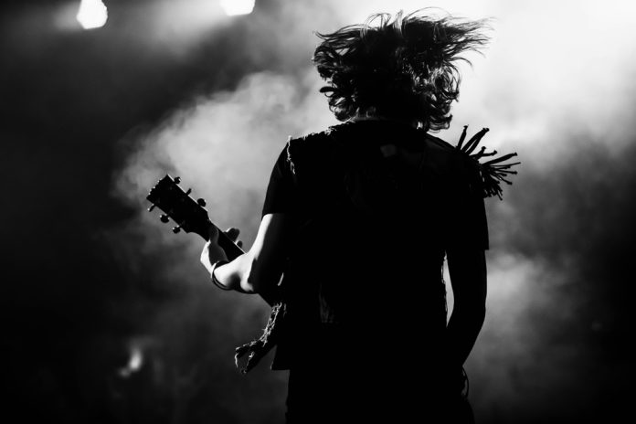 event photography guitarist at concert