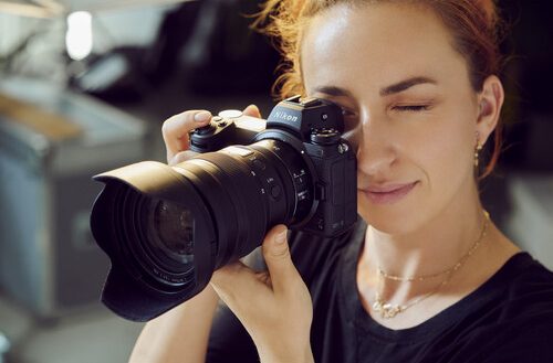 female photographer with a nikon z7 ii