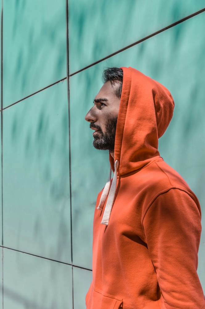 Man in orange hoodie