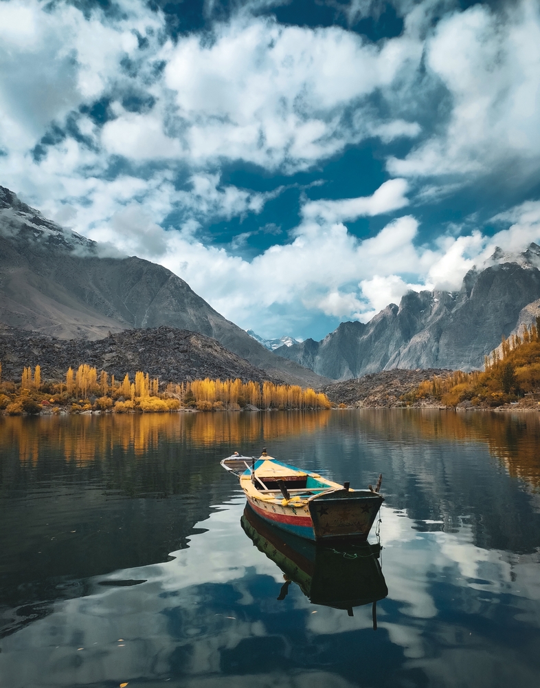 mountain lake and boat