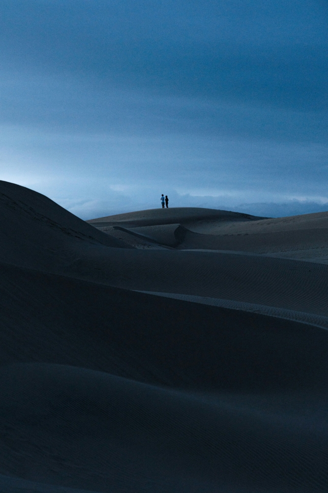 People out on sand dunes