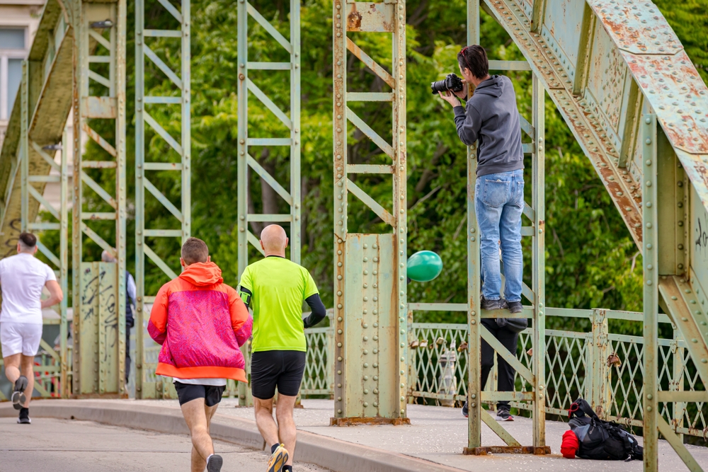 Photographer has climbed high to take photo of runners