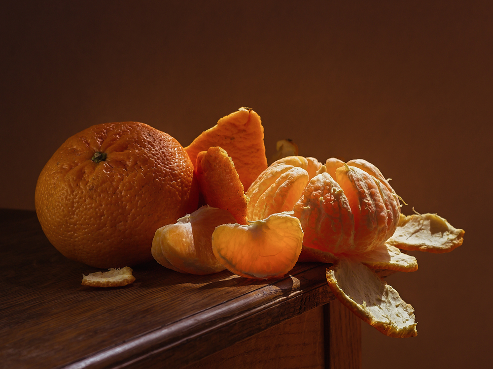 Still life of oranges on a table